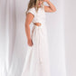 VESTIDO LARGO EN ALGODÓN BLANCO, CON  DETALLE DE ABERTURA  AJUSTABLE  EN LA CINTURA